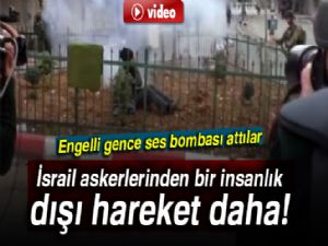 İsrail askerleri engelli gence ses bombası attı!